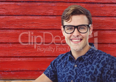 hipster with glasses and own praisred wood background