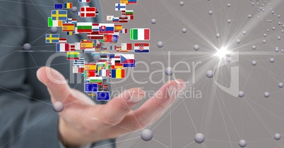 Digital composite image of business hand with flags and connecting dots