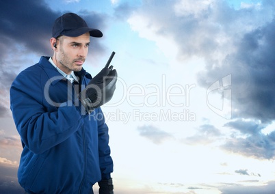 Security man outside with cloudy sky