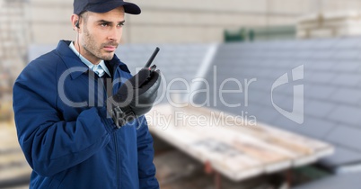 Security man on rooftop building site
