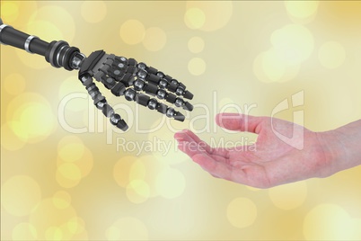 human hand touching robot hand against white background
