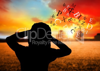 woman silhouette with text coming up from the head and the hands on the head. Field with sunset