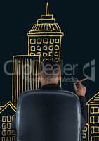 Rear view of businessman sitting on chair in front of drawn buildings while smoking