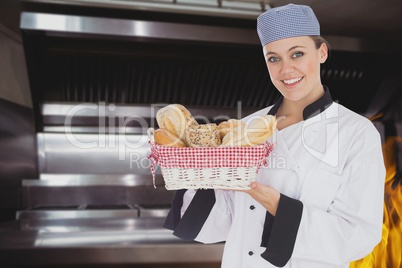 Chief holding a bread basket in her kitchen