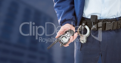 Security man outside blue background buildings