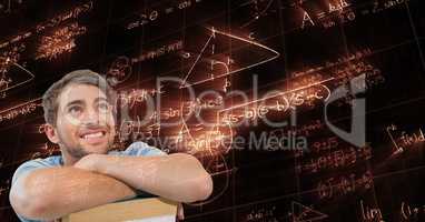Digitally generated image of man looking at glowing mathematical equations