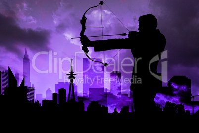 Shadow of archery player in front of purple sky background