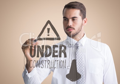 Business man drawing construction doodle against cream background