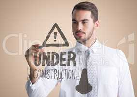 Business man drawing construction doodle against cream background