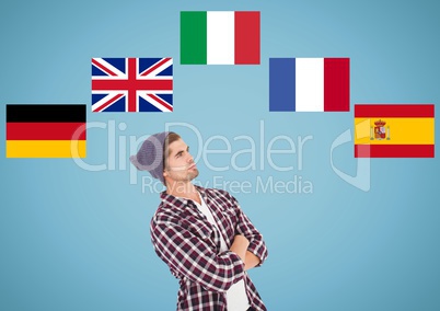 main language flags around young man thinking. Blue background