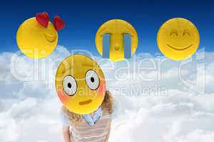 Woman with smiley on her face against cloudy background