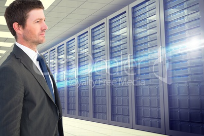 Side view of businessman holding on against database background