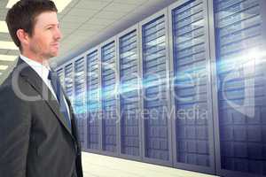 Side view of businessman holding on against database background