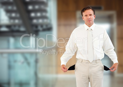 sad man with white suit and with empty pockets in front of the elevator
