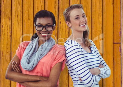 hipster friends  with yellow wood background