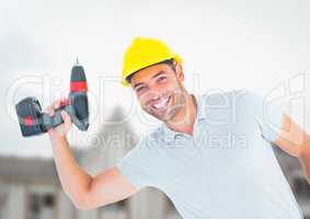 Carpenter  with drill on building site