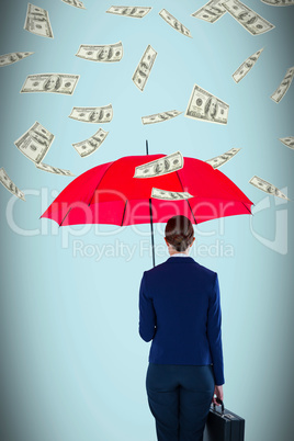 Composite image of full length rear view of businesswoman carrying red umbrella and briefcase