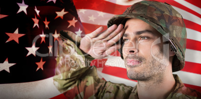 Composite image of close up of confident soldier saluting