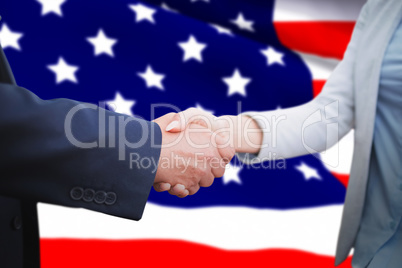 Composite image of corporate people doing handshake