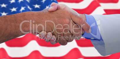 Composite image of business people shaking hands on white background