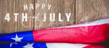 Composite image of digitally generated image of happy 4th of july text