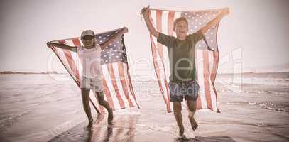 Happy children taking an american flag