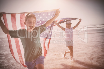 Happy children taking an american flag