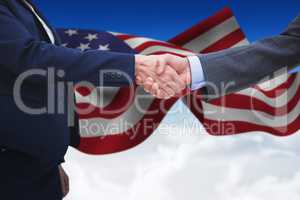 Composite image of entrepreneurs shaking hands