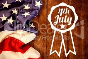 Composite image of close up of badge with 4th july text