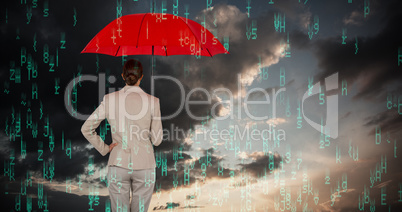 Composite image of rear view of businesswoman carrying red umbrella