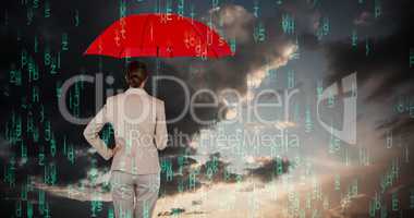 Composite image of rear view of businesswoman carrying red umbrella