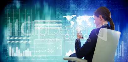 Composite image of full length of businesswoman using mobile while sitting on chair