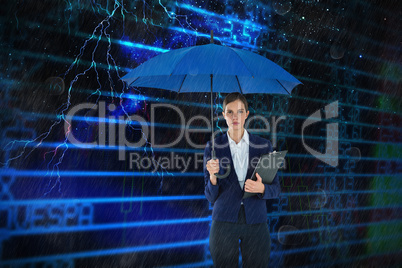 Composite image of portrait of businesswoman holding blue umbrella and clipboard