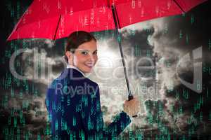 Composite image of portrait of smiling businesswoman holding red umbrella