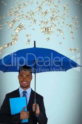 Composite image of portrait of businessman holding blue umbrella and file