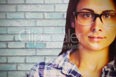 Composite image of close up portrait of young woman wearing eyeglasses