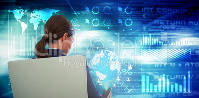 Composite image of rear view of businesswoman using mobile while sitting on chair