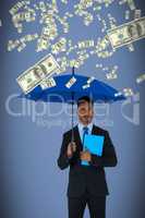 Composite image of portrait of serious businessman holding blue umbrella and file