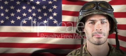 Composite image of close up of handsome soldier