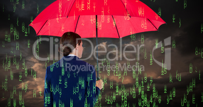 Composite image of rear view of businesswoman carrying red umbrella