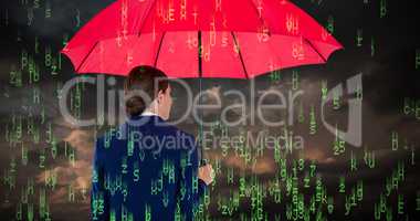 Composite image of rear view of businesswoman carrying red umbrella