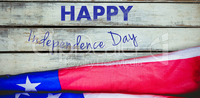 Composite image of digitally composite image of happy independence day text