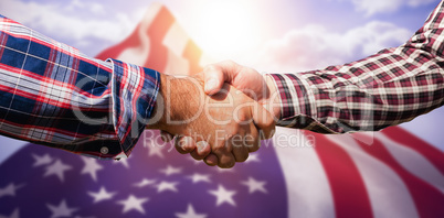 Composite image of male friends shaking hands