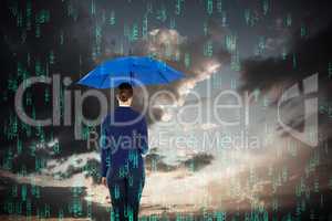 Composite image of rear view of businesswoman holding blue umbrella