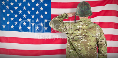 Composite image of rear view of military soldier saluting