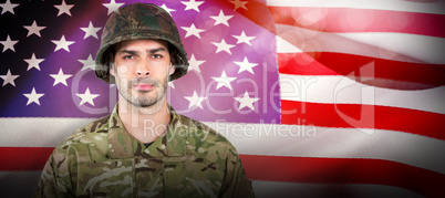 Composite image of soldier standing against white background