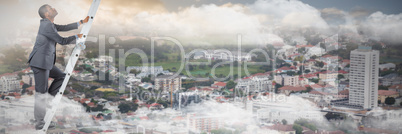 Composite image of businessman climbing up ladder