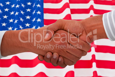 Composite image of corporate men doing handshake
