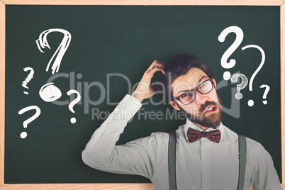 Composite image of portrait of confused man scratching head