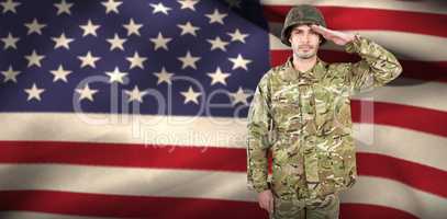 Composite image of portrait of confident soldier saluting